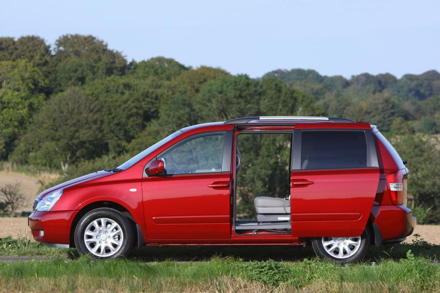  Kia Sedona 2010 года  (фото 11 из 54)